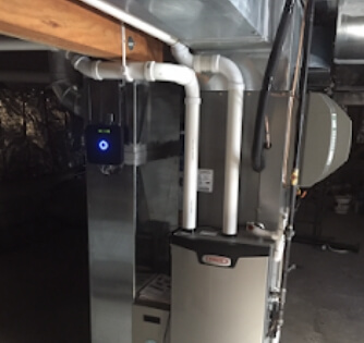 A hot water unit installed in a basement