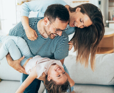 A family playing in a comfortable home