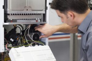 technician-repairing-a-furnace