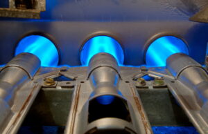 blue-flames-on-burners-inside-a-gas-furnace