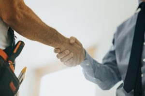contractor-and-homeowner-shaking-hands