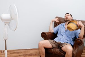 overheated-person-in-front-of-a-fan